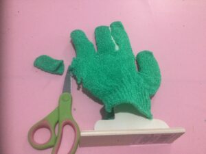 Cutting the exfoliating glove