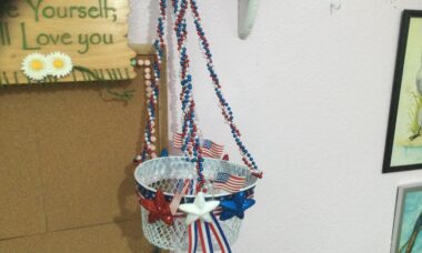 white Americana wire hanging basket