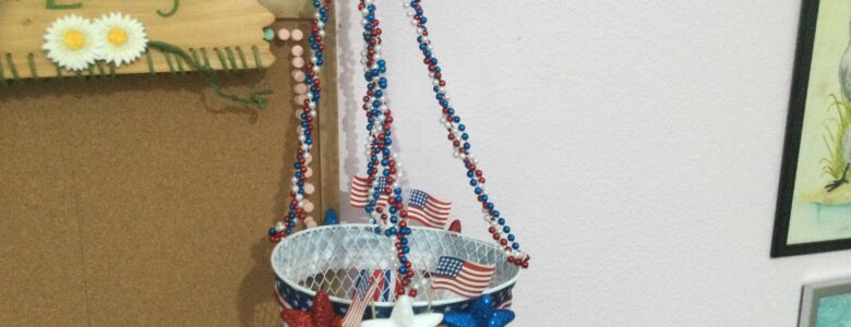 white Americana wire hanging basket