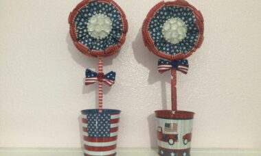 Patriotic paper flowers in tin buckets