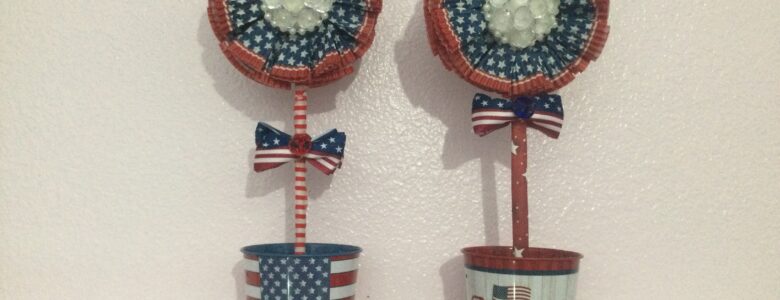 Patriotic paper flowers in tin buckets