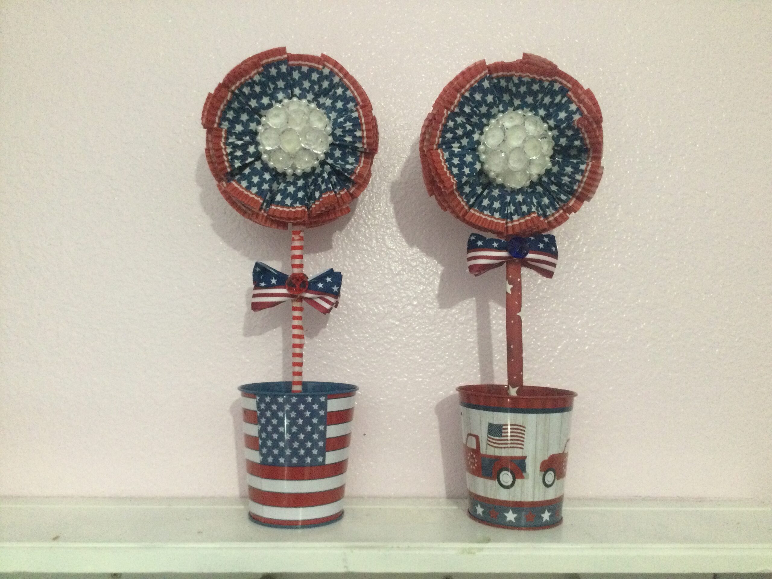 Patriotic paper flowers in tin buckets